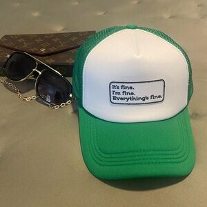 Green and white trucker hat “it’s Fine, I’m  Fine, Everything Is Fine“